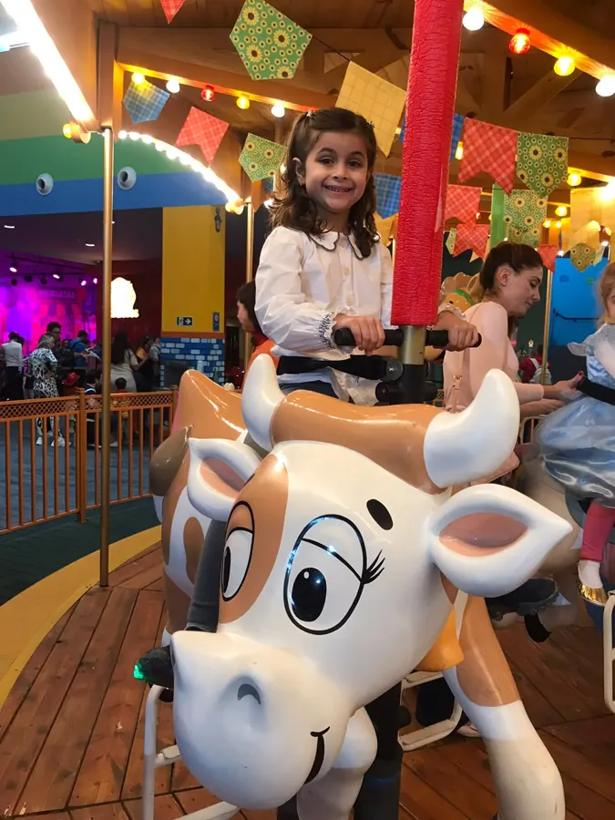 De vaquinha no carrossel 🐮